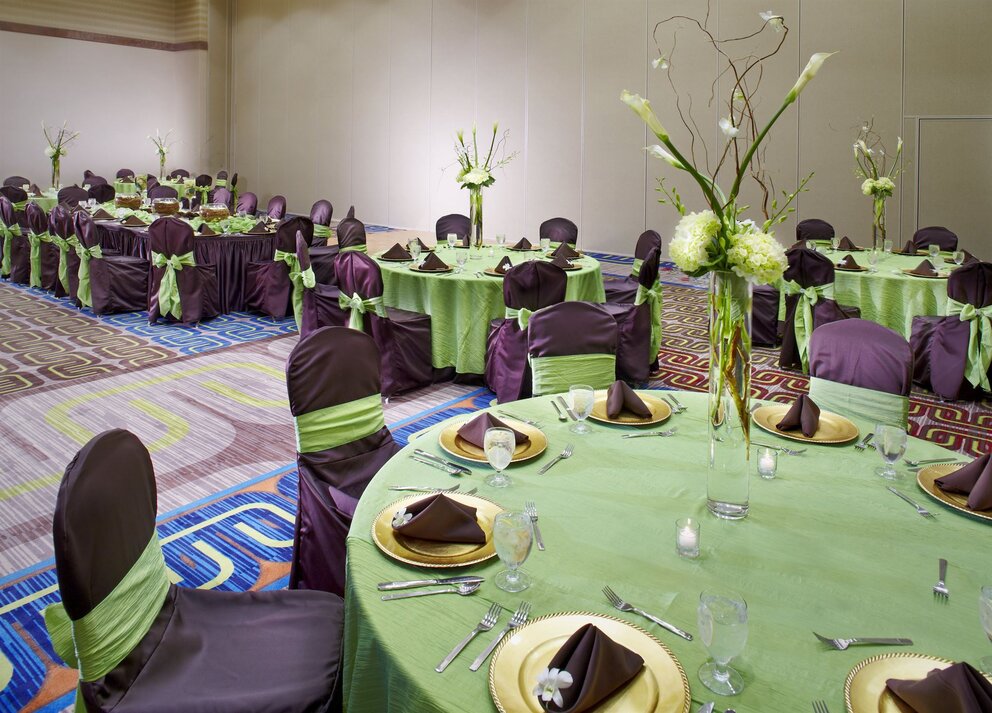 Custom meeting decor with banquet tables at Texarkana Convention Center