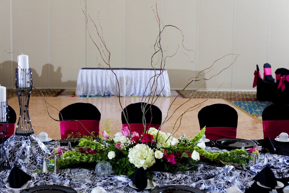 Wedding buffet table with floral décor at Texarkana Convention Center wedding venue in Texarkana.