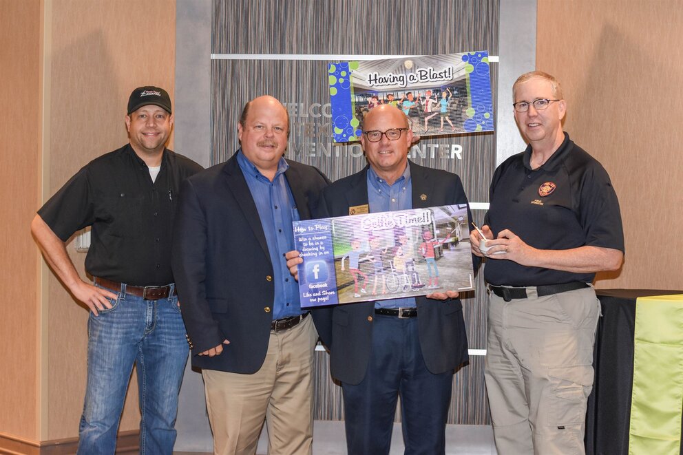 men posing for a photo at Texarkana Convention Center