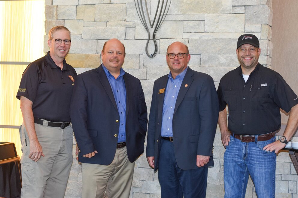 men posing for a photo at Texarkana Convention Center