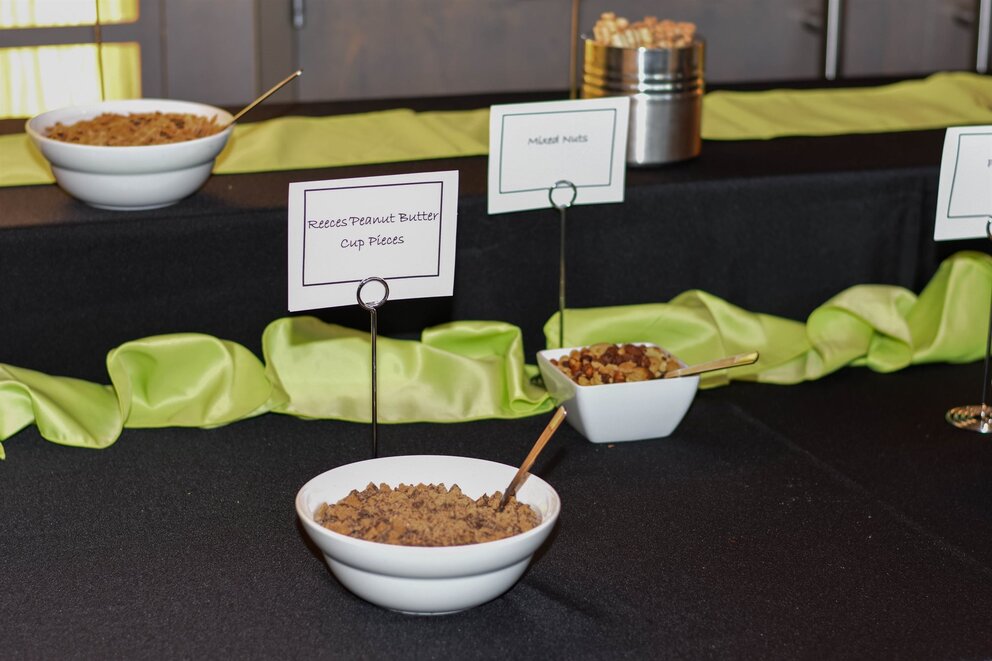 bowls of ice cream toppings on a table at Texarkana Convention Center