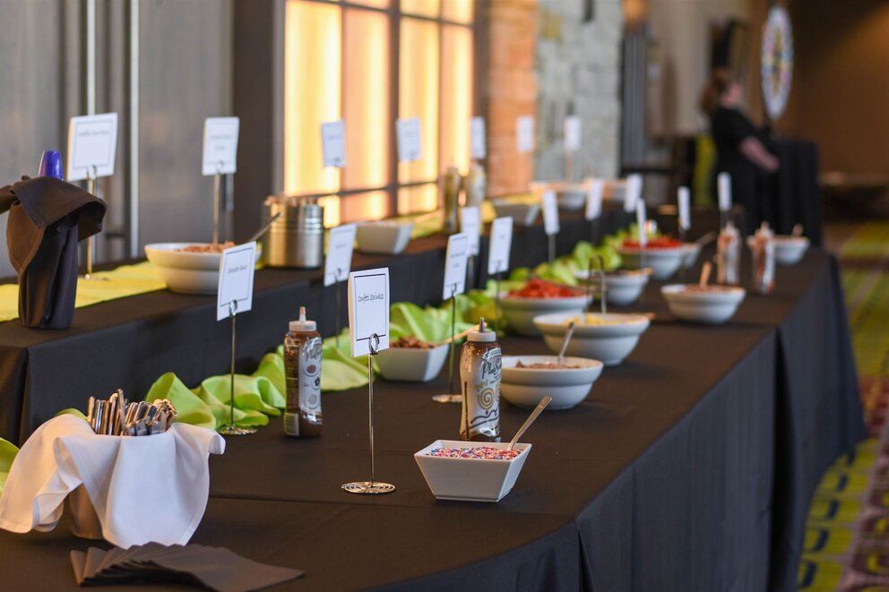 Ice Cream toppings in a row on a table at Texarkana Convention Center