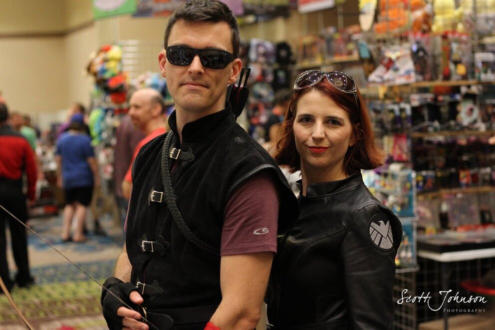 couple posing for a photo at Comic Con